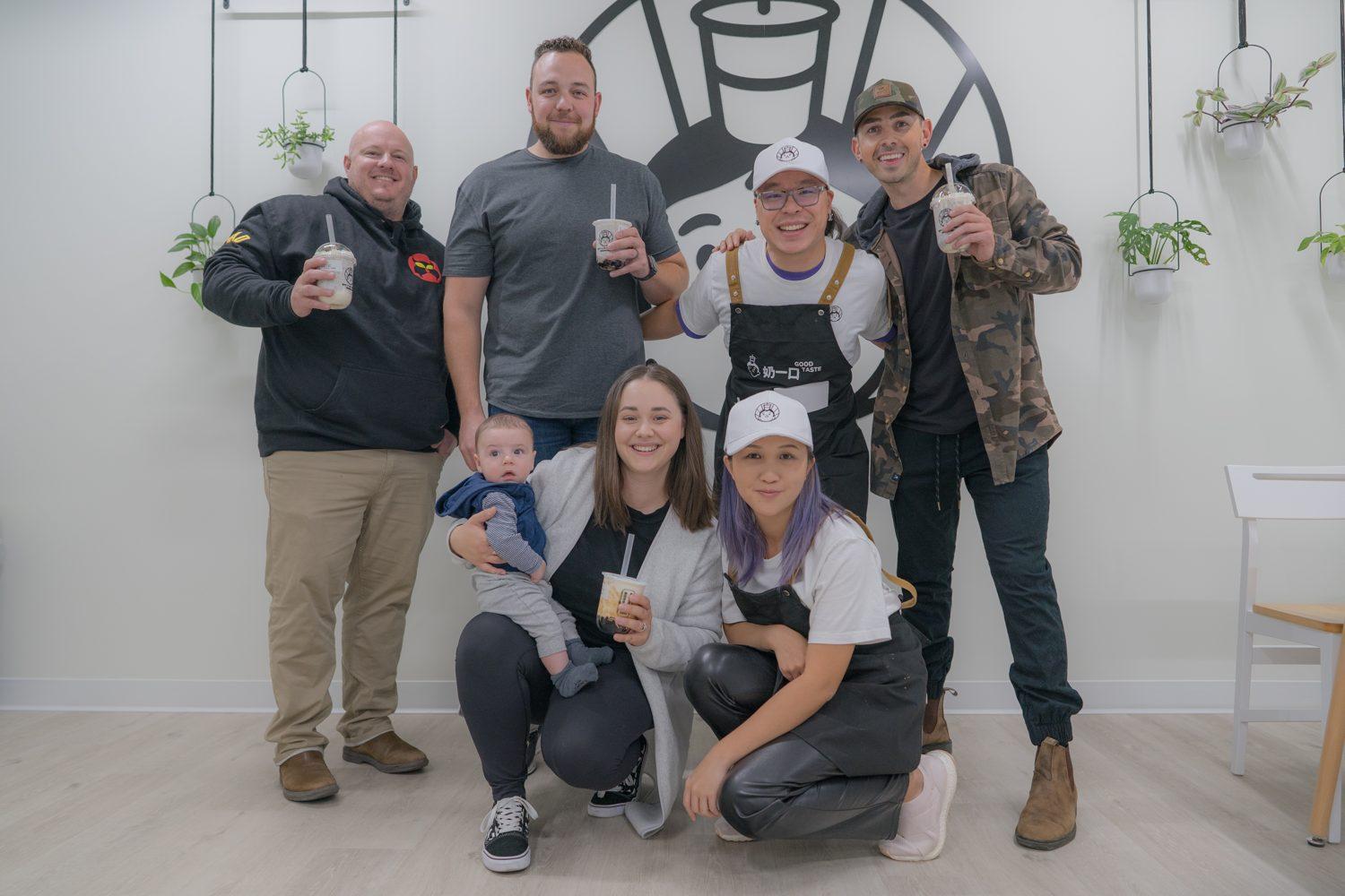 Customers and Yogost staff posing together in Saskatoon