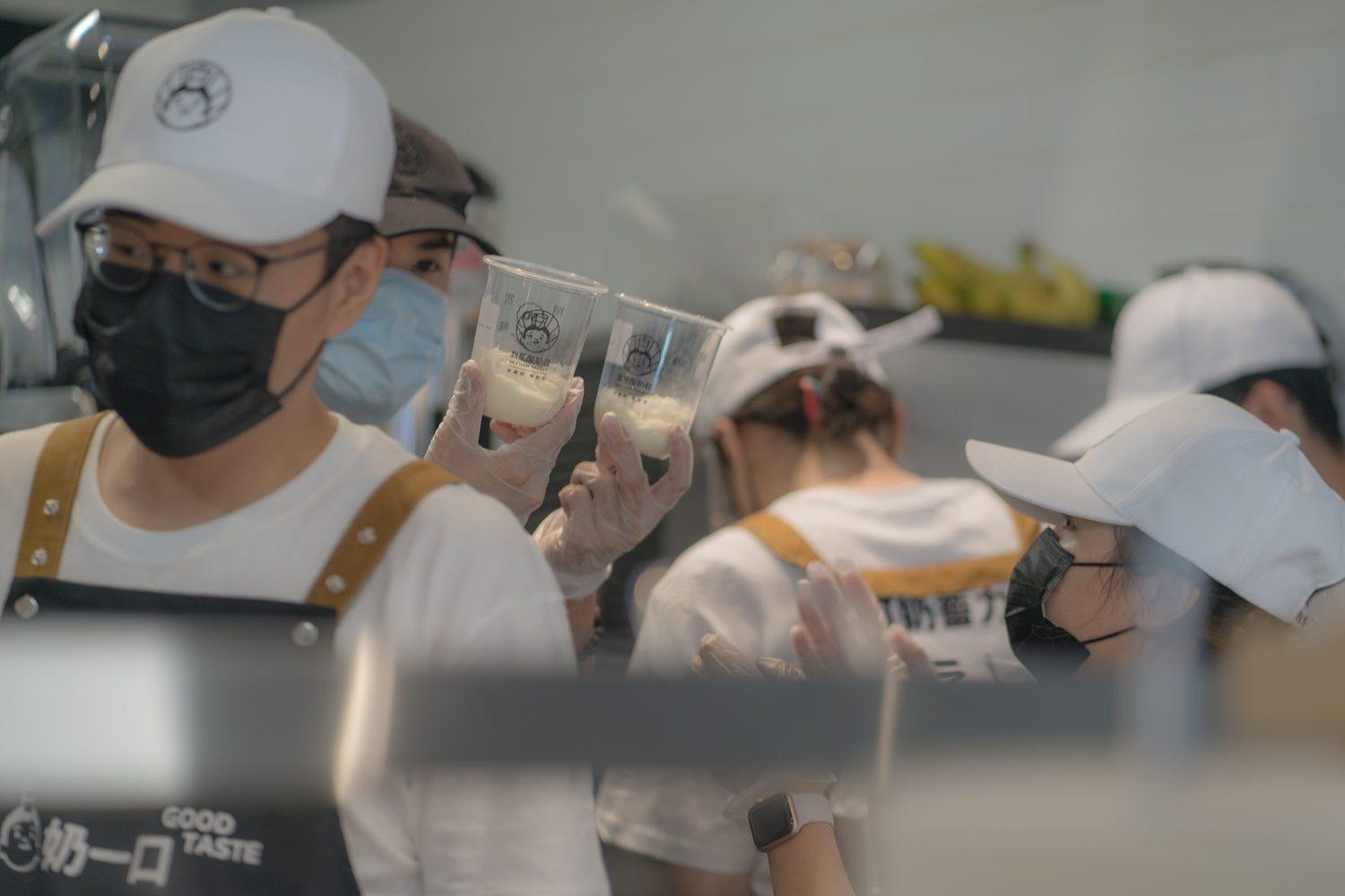 Winnipeg Yogost staff comparing two prepared cups